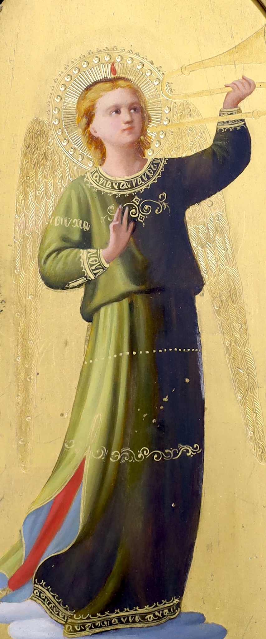 Oil on gilt panel, Heralding angel, housed in a Gothic arched gilt frame, 25 x 10cm